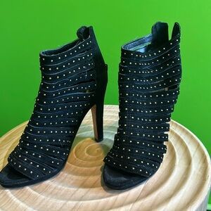 Dolce Vita caged bootie in black suede and gold studs. Back heel zipper.